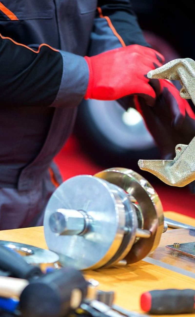 a-car-mechanic-works-in-a-car-repair-shop-close-up-LKM9A82-1.jpg